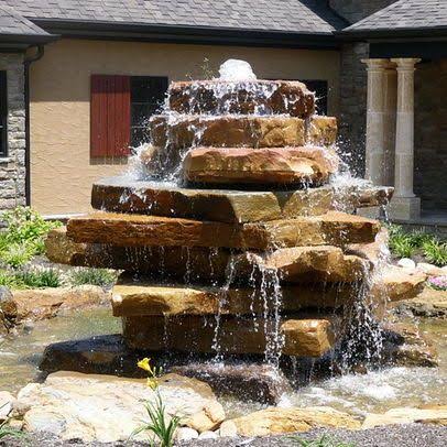 10 ide air terjun mini terbuat dari batu alam, bikin rumah