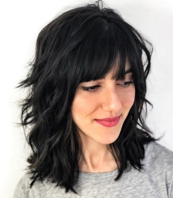 Layered cut with blunt bangs